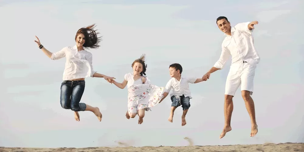 family jumping for Wimbledon Chiropractic & Sports Injury Clinic | Chiropractor Wimbledon